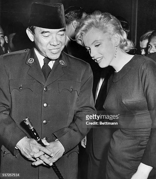 Indonesia's President Sukarno is shown chatting with actress Marilyn Monroe during a party given by Mr. And Mrs. Joshua Logan at a Beverly Hills...
