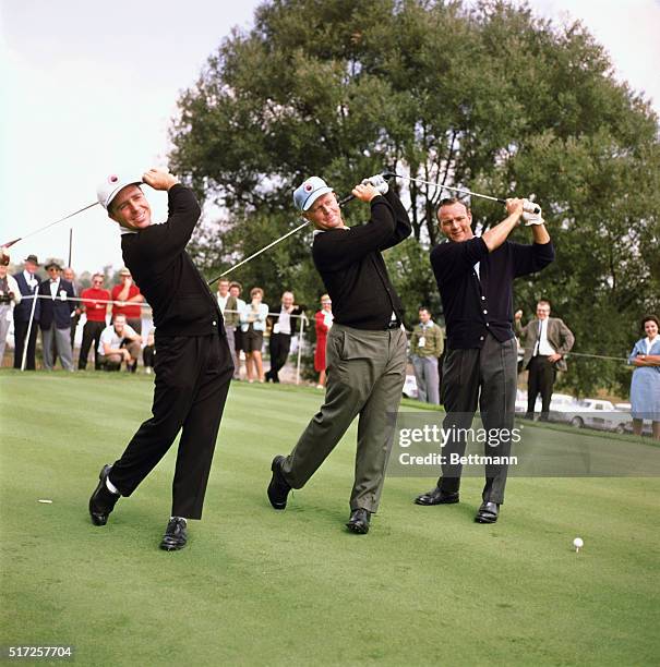 Arkon, O.: Firestone Country Club, big three golfers in the world series of golf. Arnold Palmer, hatless, Jack Nicklaus and Gary Player swing their...