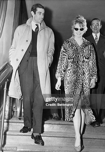 French film star Brigitte Bardot and Husband, film director Roger Vadim, as they left divorce court. They announced that there will be no...