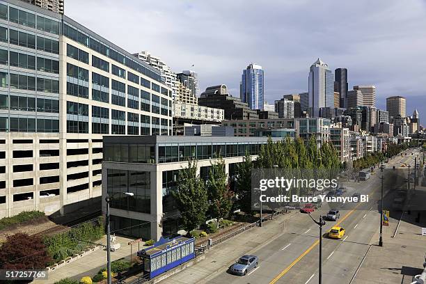 downtown seattle and alaskan way - seattle traffic stock pictures, royalty-free photos & images