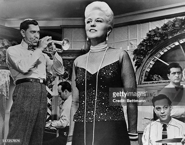 Songstress Peggy Lee and cornet player Jack Webb offer a blues number in Webb's new Warner Bros. Movie, Pete Kell's Blues. Webb, star of NBC-TV's...