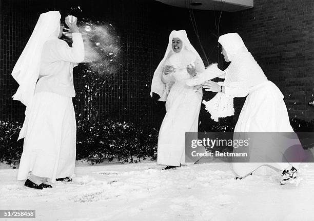 Three nuns at St Joseph Hospital and Rehabilitation Center were as delighted as youngsters at the cities' first snowfall. Engaged in an old fashioned...