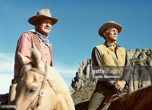 John Wayne and Kirk Douglas on horseback in the 1967 film The War Wagon.