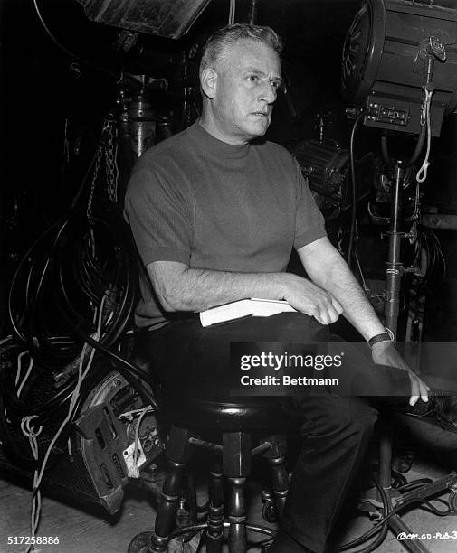 Lining up the next shot, producer-director Stanley Kramer is seen among the impediments of his craft on the set of Guess Who's Coming To Dinner, a...