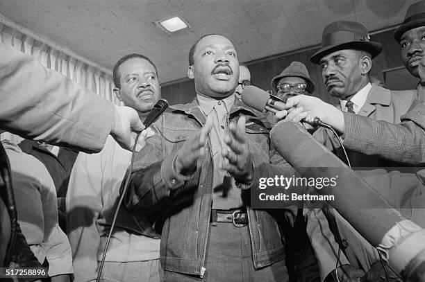 Released. Birmingham, ALA: Rev. Ralph Abernathy and Dr. Martin Luther King are greeted with microphones as they emerge from the Jefferson County jail...