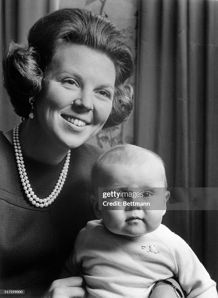 Queen Beatrix of the Netherlands Holding her Son