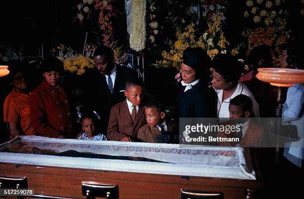 Family of slain civil rights leader, Dr. Martin Luther King, view his body as it lies in state at Sister's Chapel at Spelman College. Left to right:...