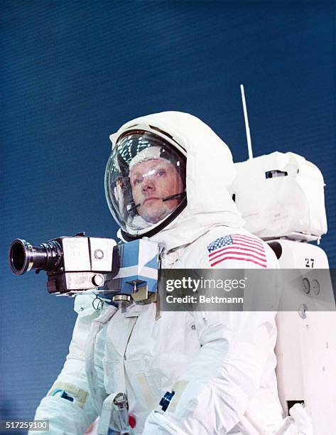 Apollo 11 Spacecraft Commander Neil Armstrong in the spacesuit as he will appear on the lunar surface. A camera is attached to his chest area giving...