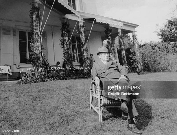 Rare Occasion. Vevey, Switzerland: Charlie Chaplin relaxes in front of his villa near Lake Geneva prior to playing host to reporters. The 80-year-old...