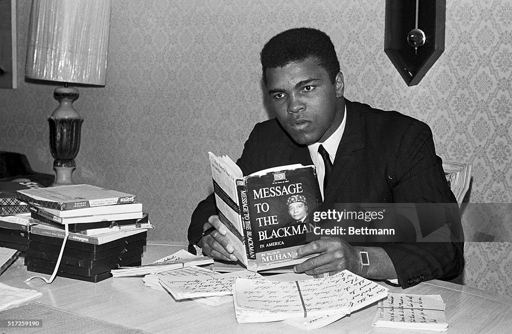 Muhammad Ali Reading a Book
