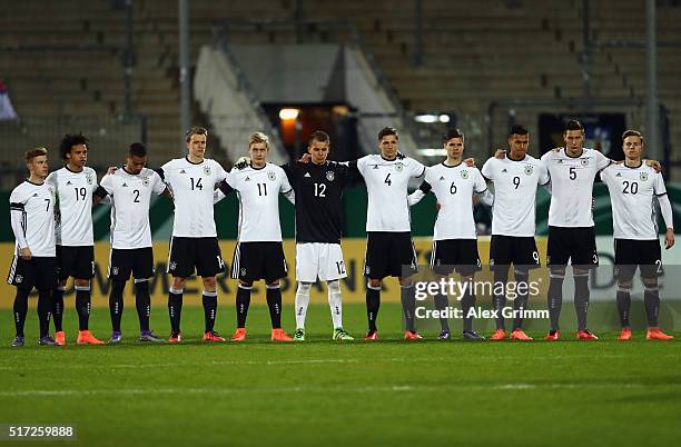 Players of Germany observe a minute of silence for the victims of the terror attack in Brussels prior to the 2017 UEFA European U21 Championships...