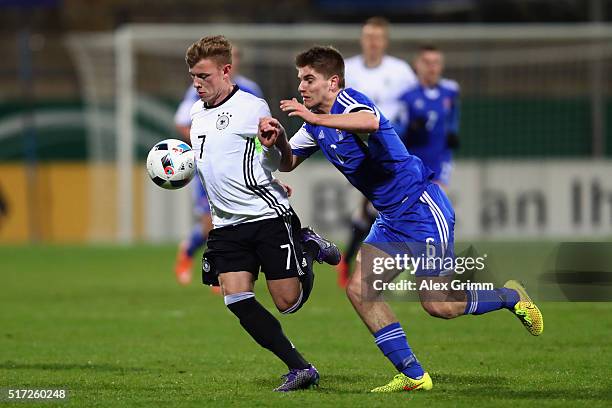 Max Meyer of Germany is challenged by Jonas Gejel Hansen of Faroe Islands during the 2017 UEFA European U21 Championships qualifier match between...