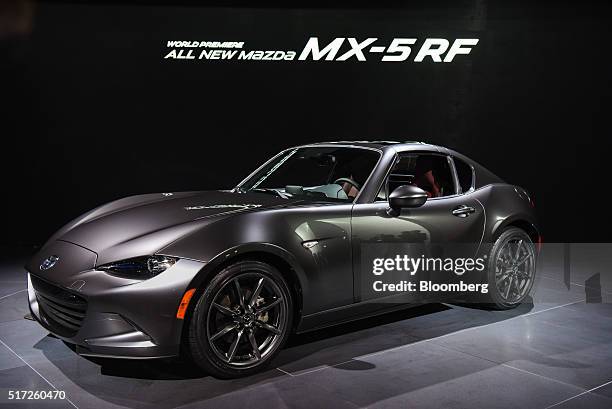 The Mazda MX-5 RF sits on display during 2016 New York International Auto Show in New York, U.S., on Thursday, March 24, 2016. Nearly 1,000 cars and...