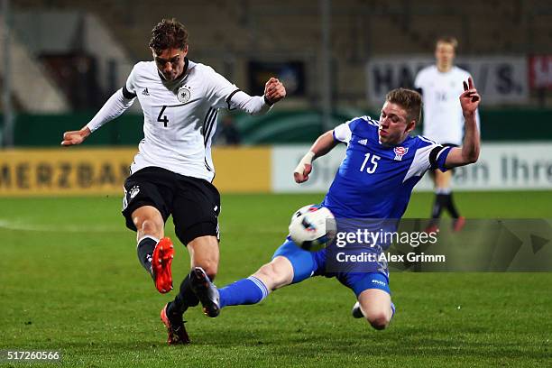 Niklas Stark of Germany is challenged by Teit Jacobsen of Faroe Islands during the 2017 UEFA European U21 Championships qualifier match between...