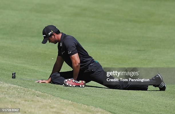 Jason Day of Australia stretches on the second fairway during the second round of the World Golf Championships-Dell Match Play at the Austin Country...