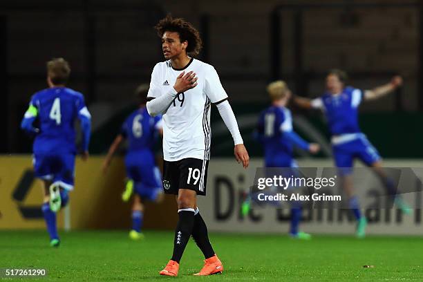 Leroy Sane of Germany reacts as Gestur Dam of Faroe Islands celebrates his team's first goal with team mates during the 2017 UEFA European U21...