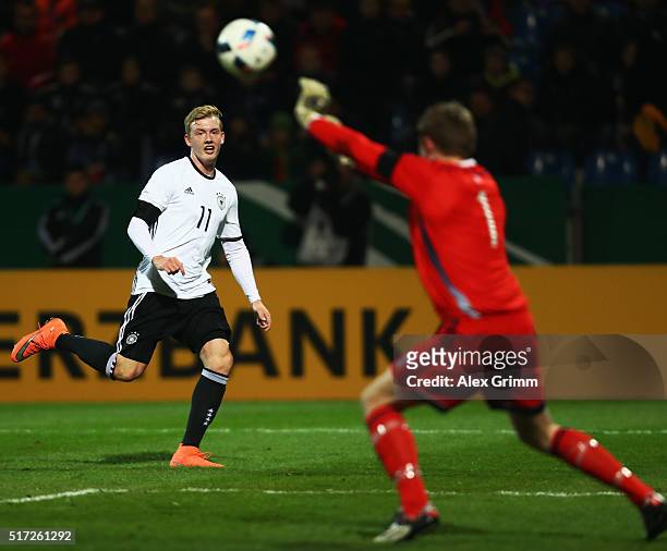 Goalkeeper Elias Rasmussen of Faroe Islands saves a shot from Julian Brandt of Germany during the 2017 UEFA European U21 Championships qualifier...