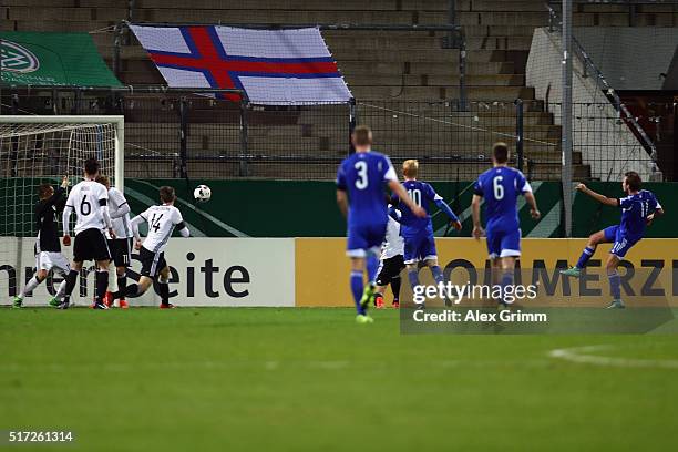 Gestur Dam of Faroe Islands scores his team's first goal during the 2017 UEFA European U21 Championships qualifier match between Germany U21 and...