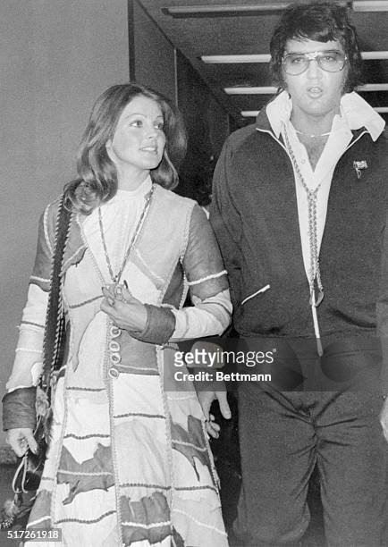Entertainer Elvis Presley leaves Santa Monica California Superior Court after being granted a divorce from his wife Priscilla. The couple had been...