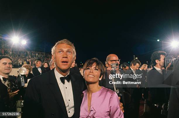 Hollywood, CA-ORIGINAL CAPTION READS: Actor Steve McQueen and his wife arrive for the Academy Awards.
