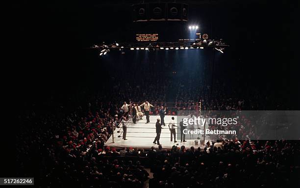 This is a view of the Cassius Clay , versus Zora Folley fight at Madison Square Garden in New York City.