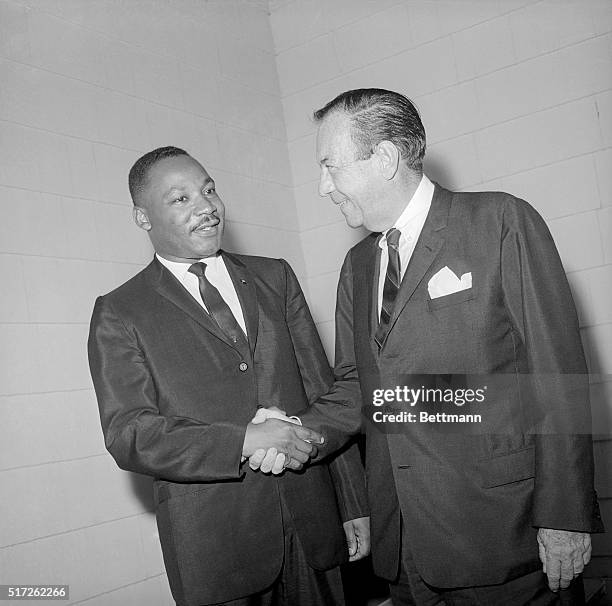 Mayor Robert Wagner greets Dr. Martin Luther King, Jr. As the Negro leader arrived late in the evening July 27th at Gracie Mansion to confer on the...