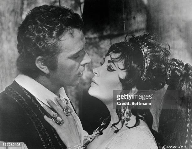 Elizabeth Taylor and Richard Burton in a scene from the movie: Dr. Faustus.