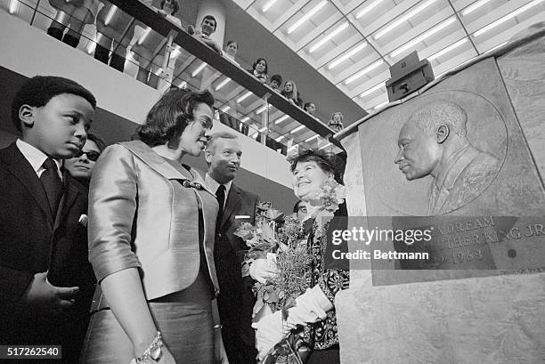 As Boston University students watch from above, Mrs. Coretta King, , unveils a bas relief of her late husband, Dr. Martin Luther King Jr., at the...