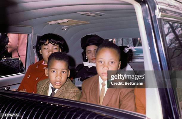 Family of slain civil rights leader, Dr. Martin Luther King, Jr., in car on the day of viewing his body as it lies in state at Sister's Chapel at...