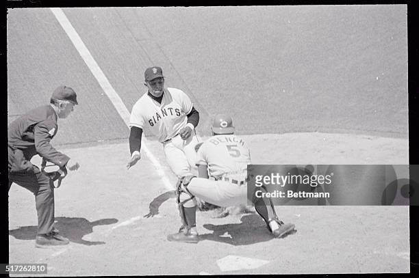 San Francisco Giant's centerfielder Willie Mays is tagged out here at home plate by Cincinnati Reds catcher Johnny Bench in the 3rd inning after...
