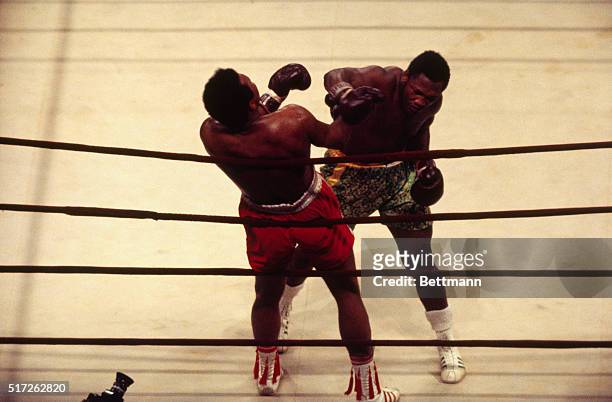 Heavyweight champion Joe Frazier punches Muhammed Ali in the 10th round of the title fight at Madison Square Garden. Frazier retained championship...
