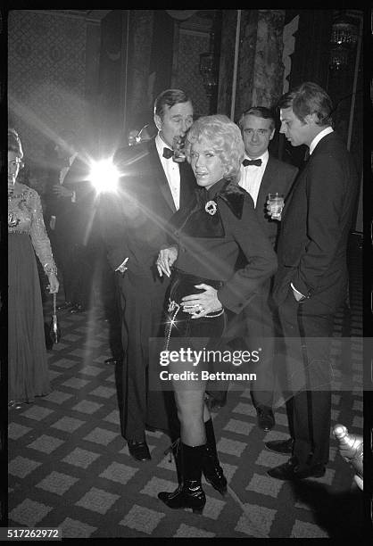 New York: Quite a flyer herself is singer Jane Morgan, decked out in black velvet hot pants suit for the Friars' Club dinner here, March 28th,...
