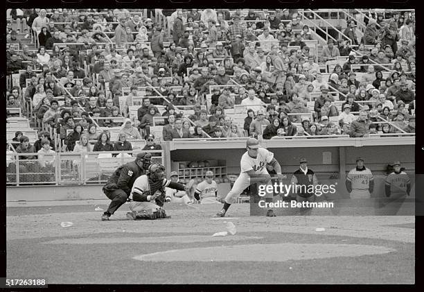 New York Met's pitcher Tom Seaver bunts during the seventh inning of the game here on April 16th. The Pittsburgh catcher is Manny Sanguillen. The...