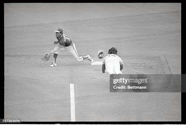 Pete Rose of the Reds is thrown out trying to steal second in the third inning. A's shortstop Bert Campaneris made the tag.