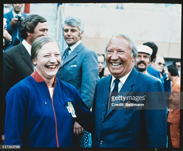 British Prime Minister Edward Heath is all smiles as he congratulated Mary Peters on her gold medal. The British "girl" was the winner of the Olympic...