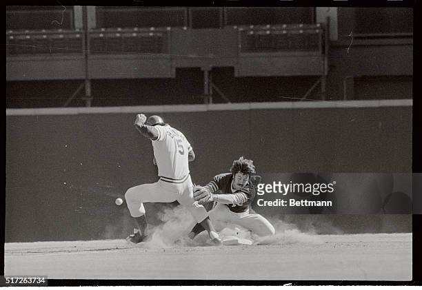 Pickoff attempt by Oakland's Jim Hunter gets by second baseman Dick Green in second inning 10/. Johnny Bench advanced to third and Tony Perez moved...
