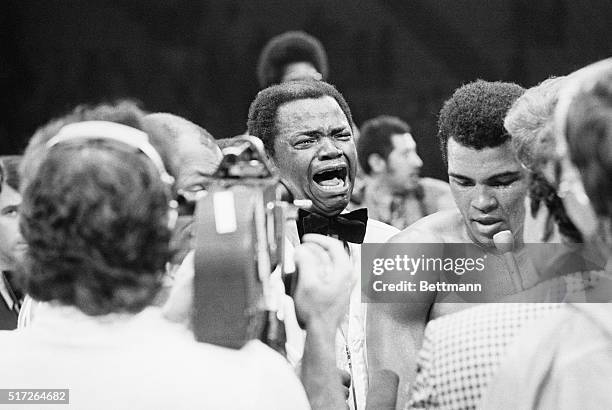 Ali Wins Split Decision. Inglewood, California: Corner man Drew "Bundine" Brown cries out "Praise the Lord" as Muhammad Ali speaks into microphone...