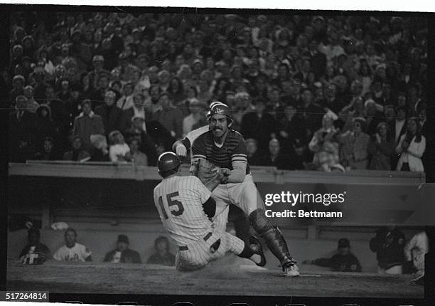 S catcher Ray Fosse makes the tag here, as Jerry Grote is out at home while trying to score in the seventh inning on Jon Matlock's single to left...