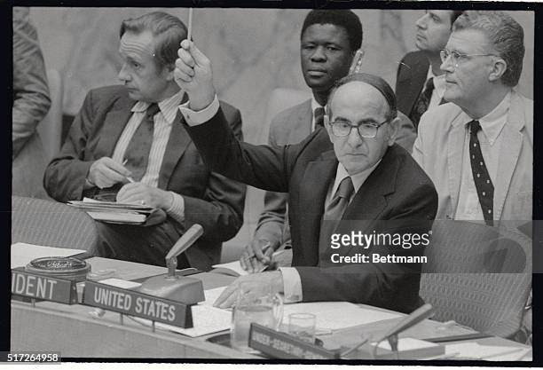 Ambassador John Scali, raises his hand to vote in the affirmative here on a Security council resolution condemning Israel for intercepting an Arab...