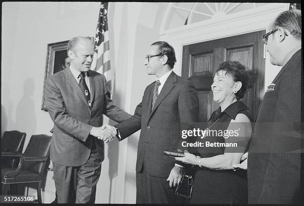 Gerald Ford and Alan Greenspan Shaking Hands