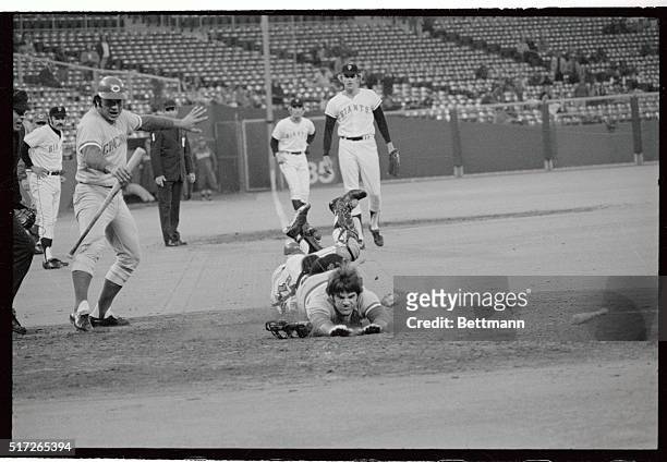 This isn't catcher Pete Rose sliding head-first into home plate during third inning of Giants-Reds game at Candlestick Park 8/2. The catcher's...