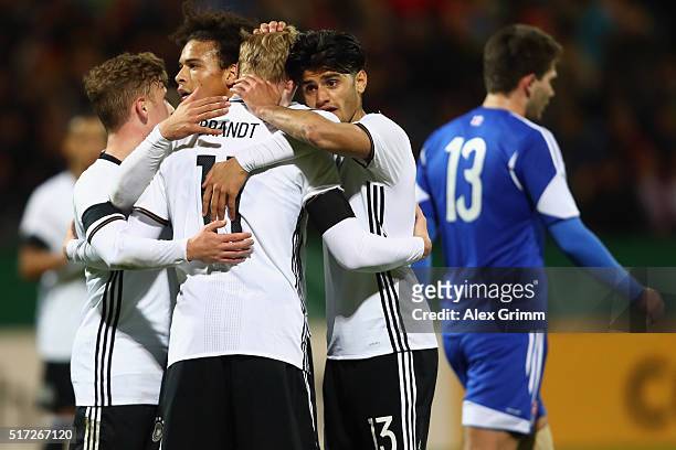 Julian Brandt of Germany celebrates his team's fourth goal with team mates Mahmoud Dahoud and Leroy Sane during the 2017 UEFA European U21...
