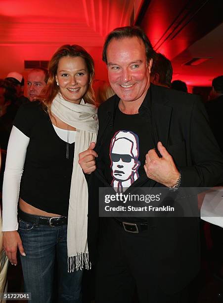 Franziska Van Almsick with H & M's European Chief Hans Andersson at the launch of Designer Karl Lagerfeld's new collection for high street fashion...