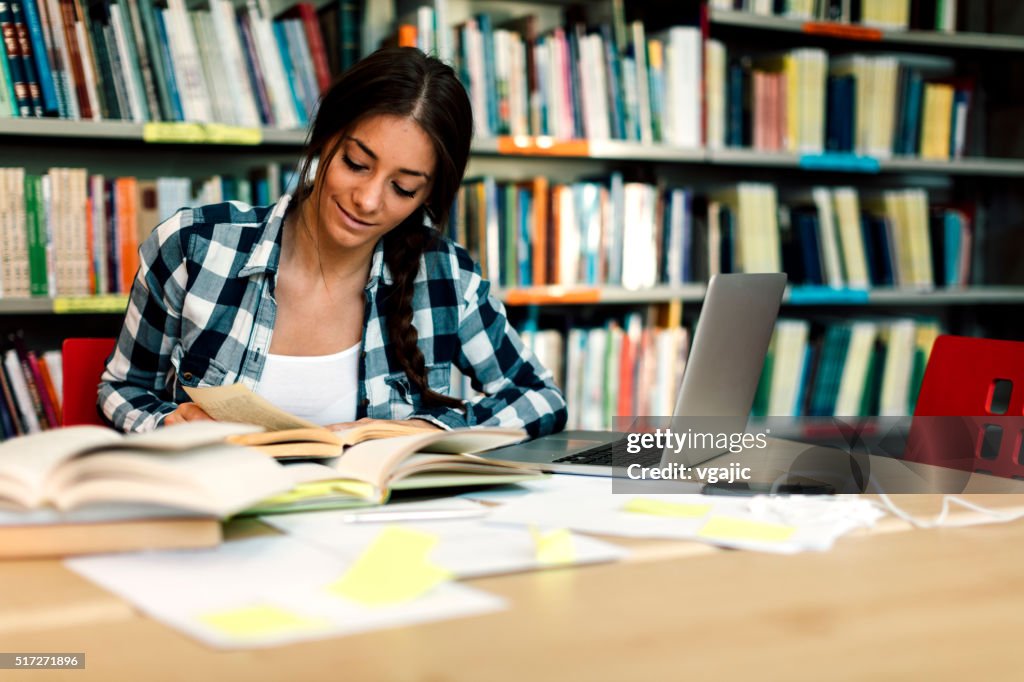 Student Read Notes Student Reading Book And Taking Notes To Study High-Res Stock Photo ...