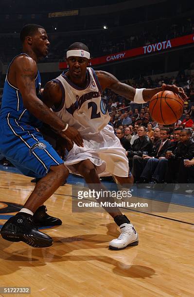 Larry Hughes of the Washington Wizards drives the basket in a game against the Orlando Magic November 10, 2004 at the MCI Center in Washington D.C....