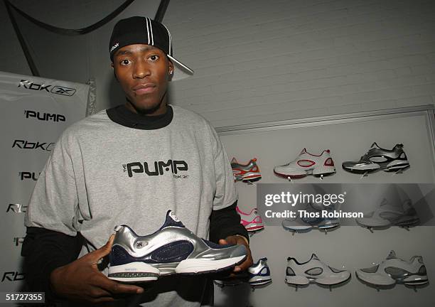 New York Knick Jamal Crawford attends the unveiling of the new Reebok Pump 2.0 sneaker November 10, 2004 in New York City. According to Reebok, the...