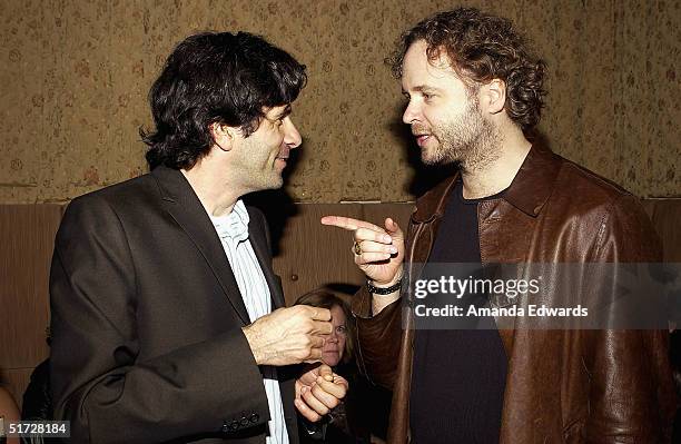 Producer Gary Winick chats with director Niels Mueller at the THINKFilm AFI Fest party on November 10, 2004 at White Lotus in Hollywood, California.