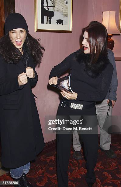 Actresses Demi Moore and Priscilla Presley backstage after seeing 'We Will Rock You', the Queen musical at the Dominion Theatre on November 10, 2004...