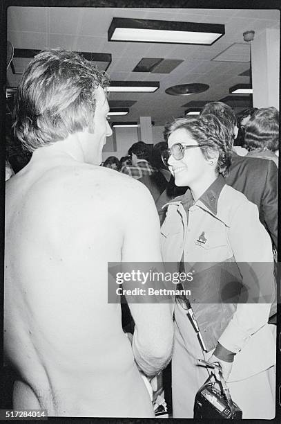 Canadian sports reporter Marcelle St. Cyr of Montreal French-language radio station CKLM, interviews Guy Lafleur of the Montreal Canadiens in the...