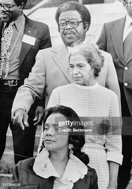 At the 20th anniversary of the 1955 bus boycott, three of the principals come down the steps of the Dexter Avenue Baptist Church, led by Mrs. Coretta...